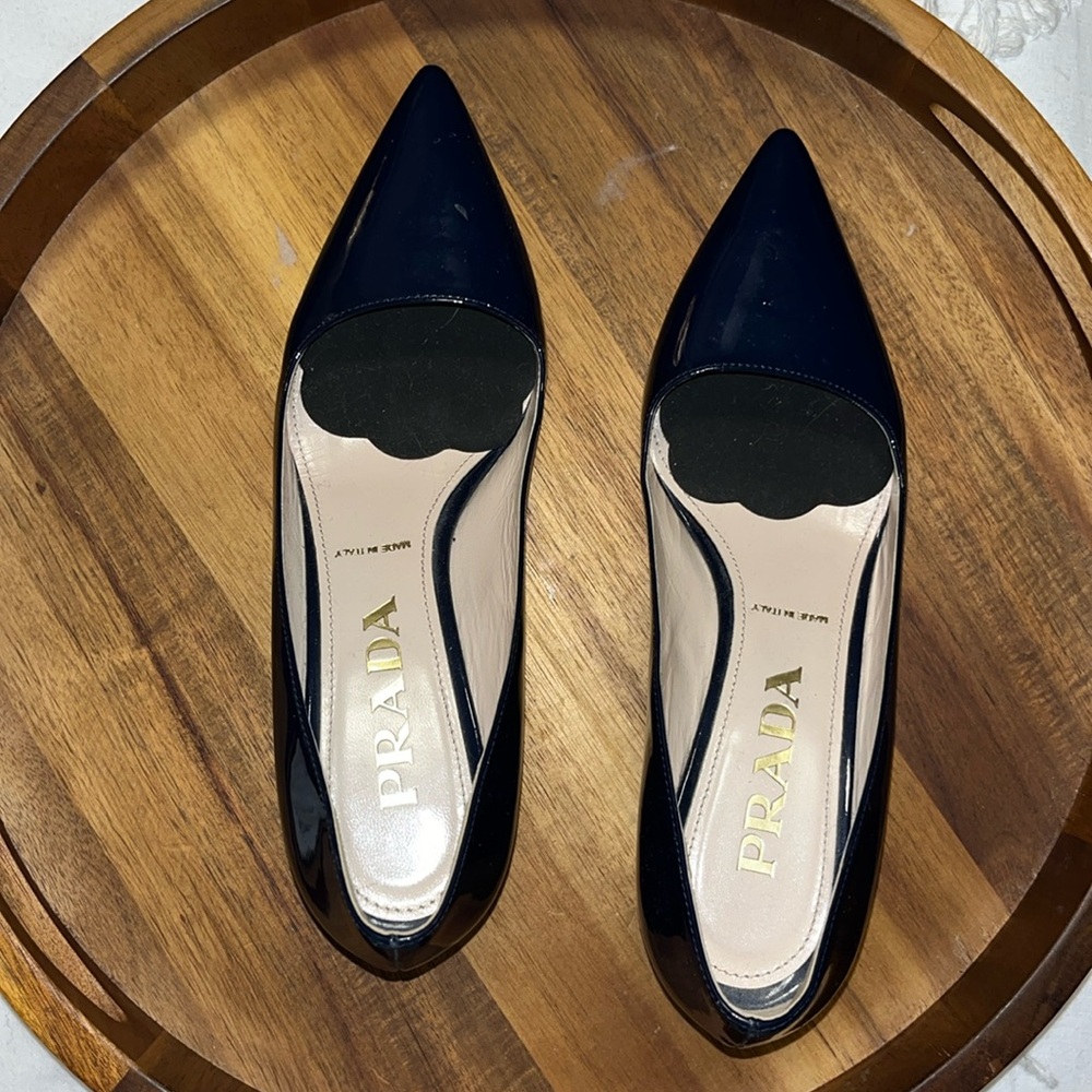 Blue short heeled Prada shoes
